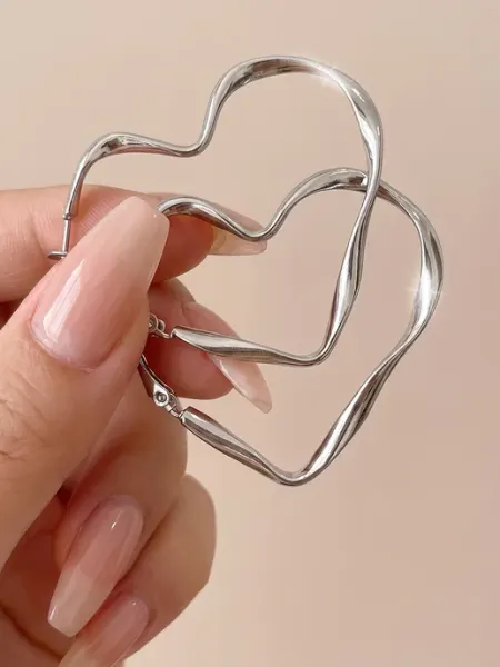 Серьги кольца сердечки большие Polovinka