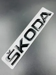 Эмблема значок на крышку багажника Skoda. Шильдик Шкода (длина 150мм) черный