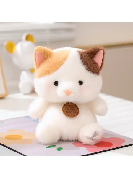 Мягкая пушистая игрушка котенок